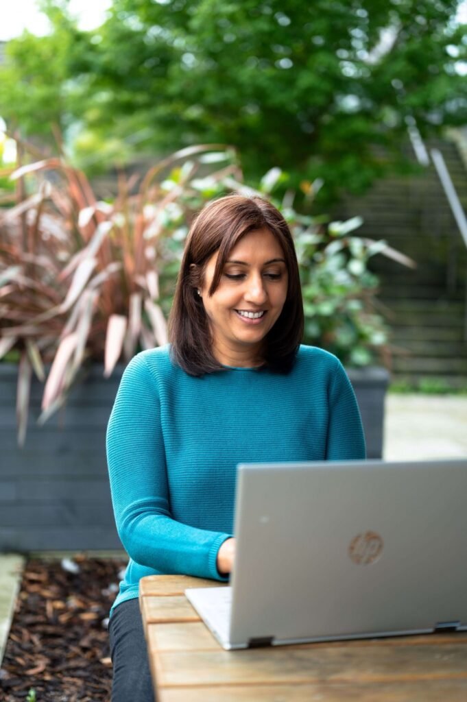 Me-at-laptop-Jaskiran-McPhail-scaled-1.jpg
